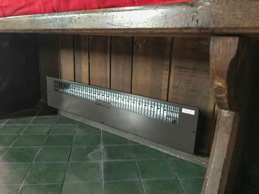 Pew heater fitted directly to pew backboards