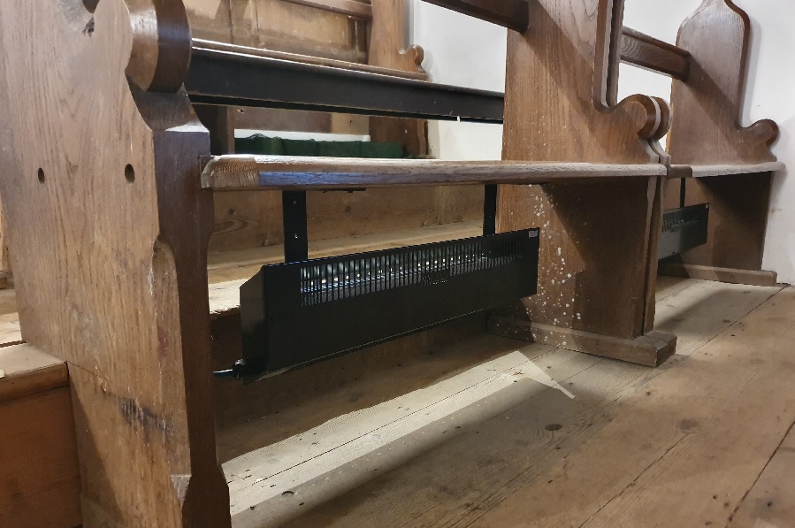 PH Pew Heater installed under a church pew